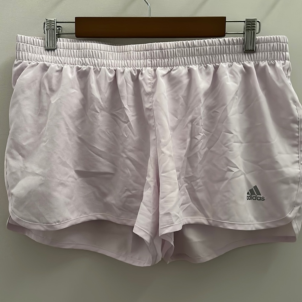 Light pink Adidas running shorts